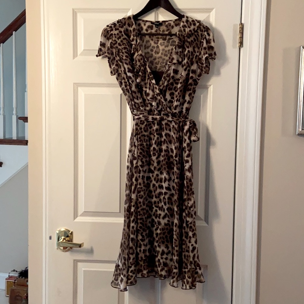 Sweet, feminine flowy, leopard print dress.